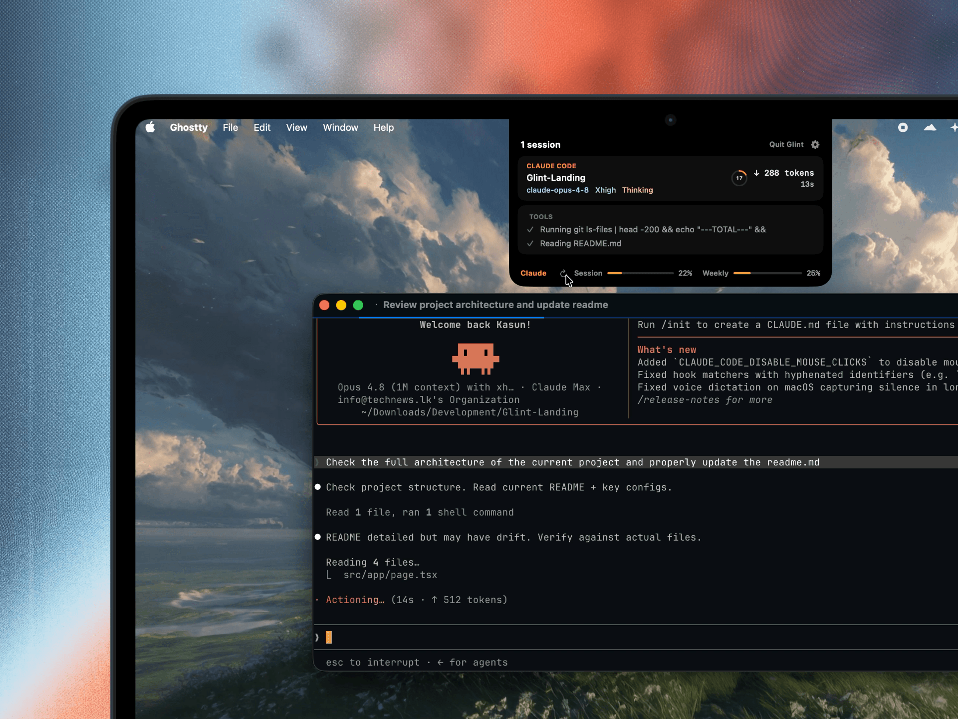 Glint running on a MacBook - the island near the notch above a Ghostty terminal session